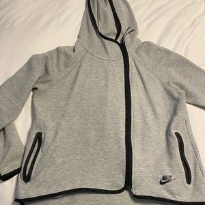 Women’s size M hooded zip-up grey jacket, with thumb holes